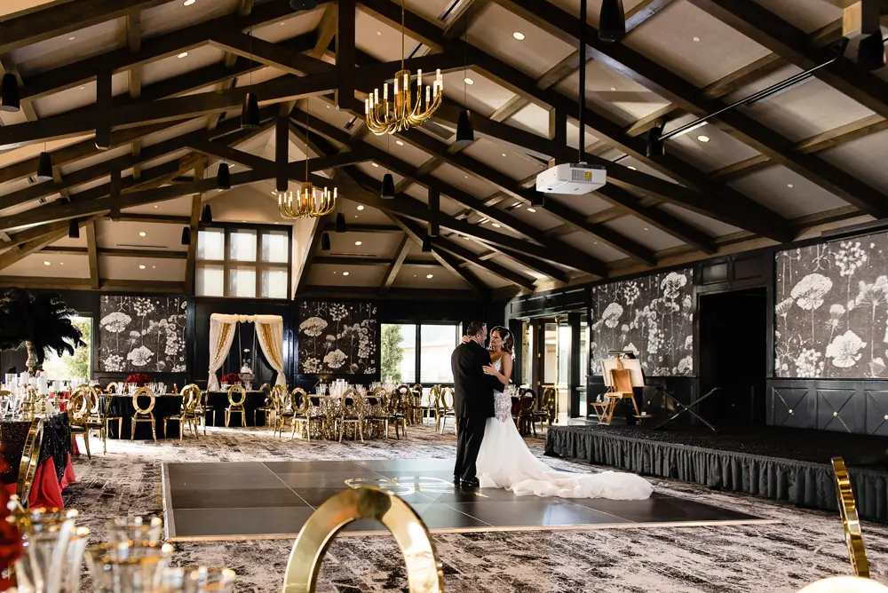 A couple dancing in the Red Berry Estate ballroom.
