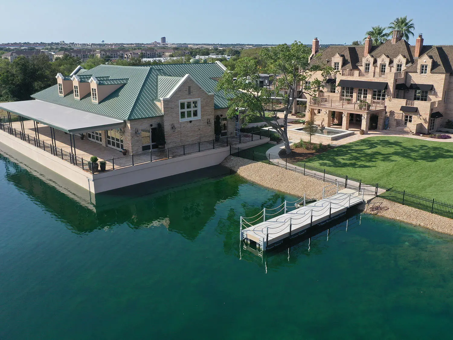 Aerial shot of the red berry estate and lakeside veranda