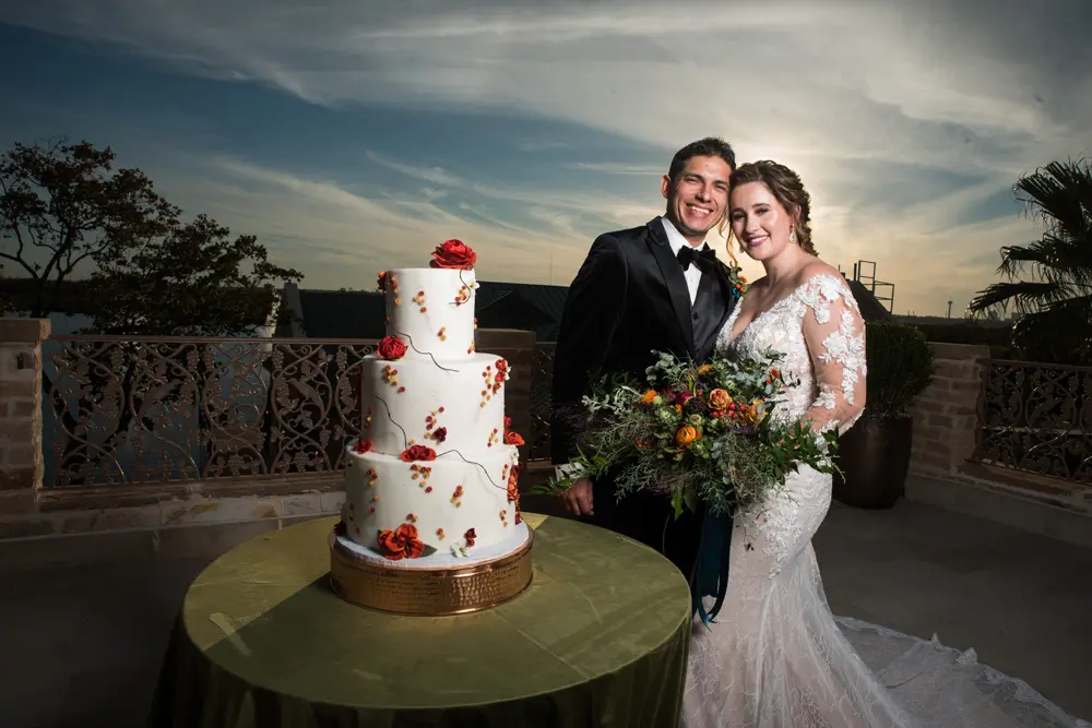 Happy Couple with their wedding cake.