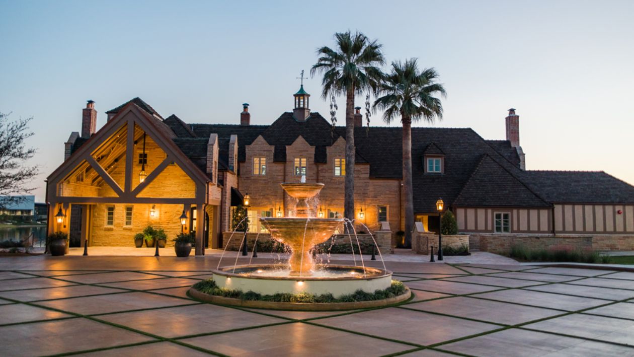 View of the front of the Red Berry Mansion at dusk 