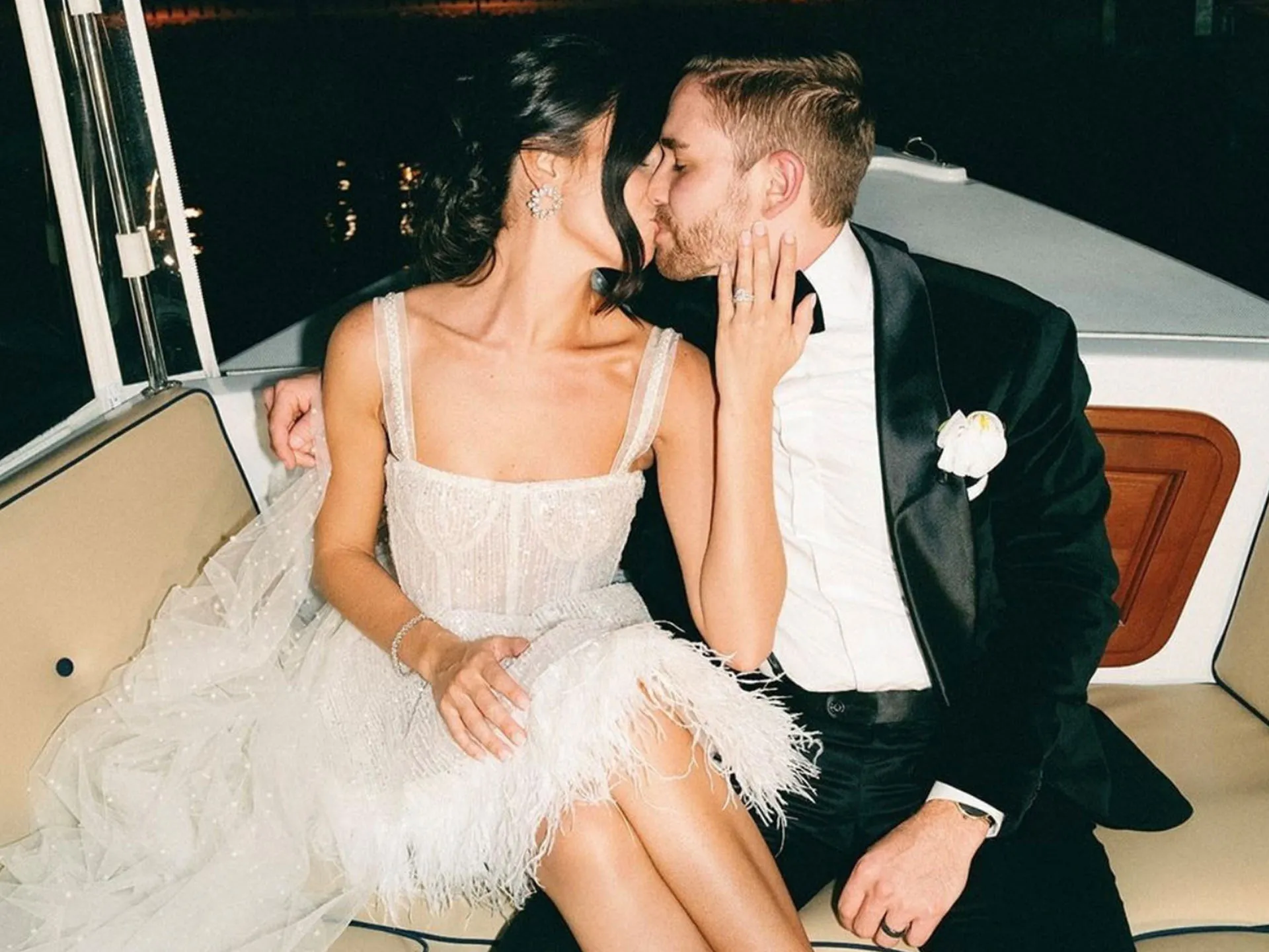 Couple on boat after wedding