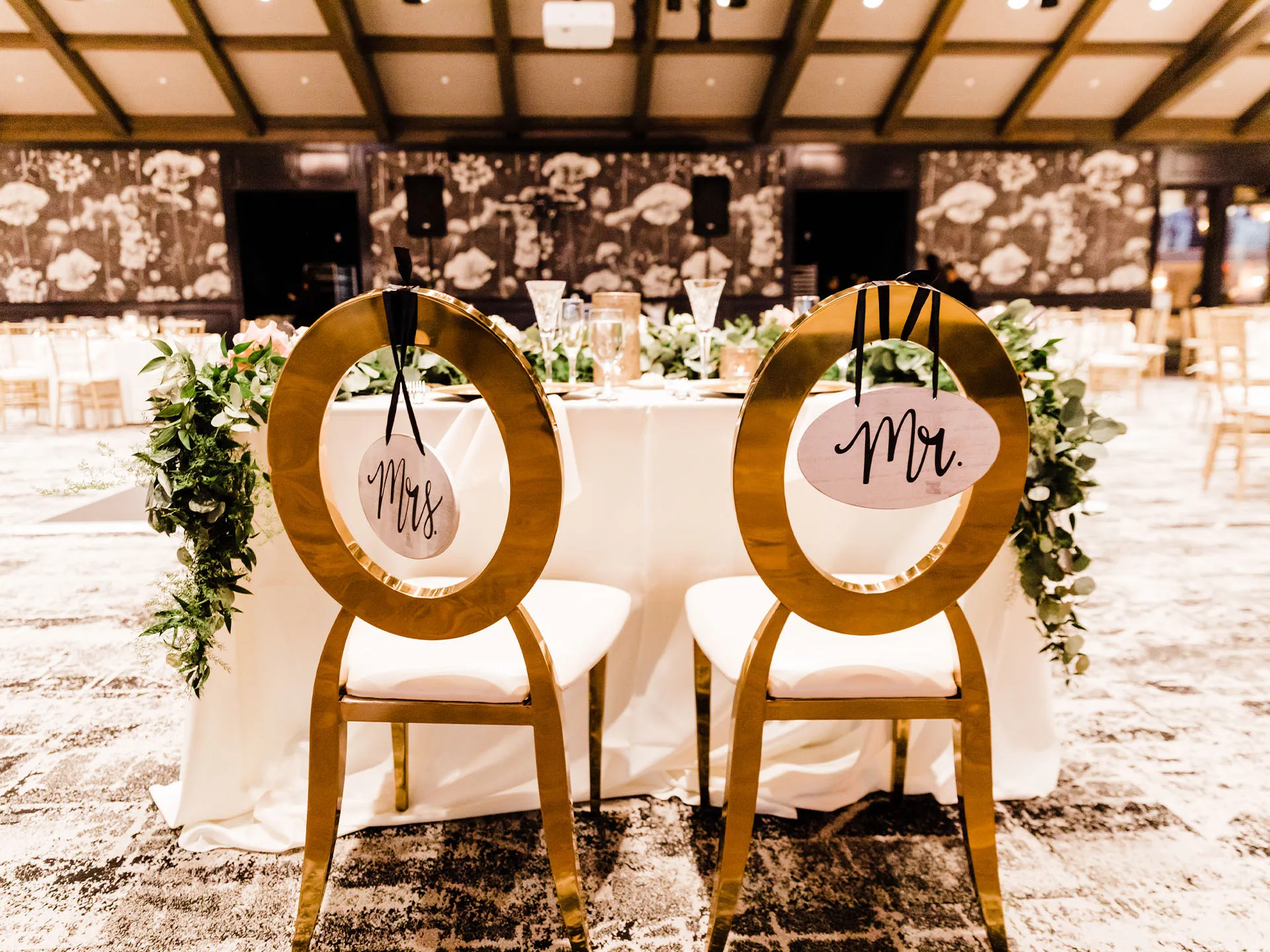 Wedding Table for Bride and Groom with Mr and Mrs cards labeled on back of chairs